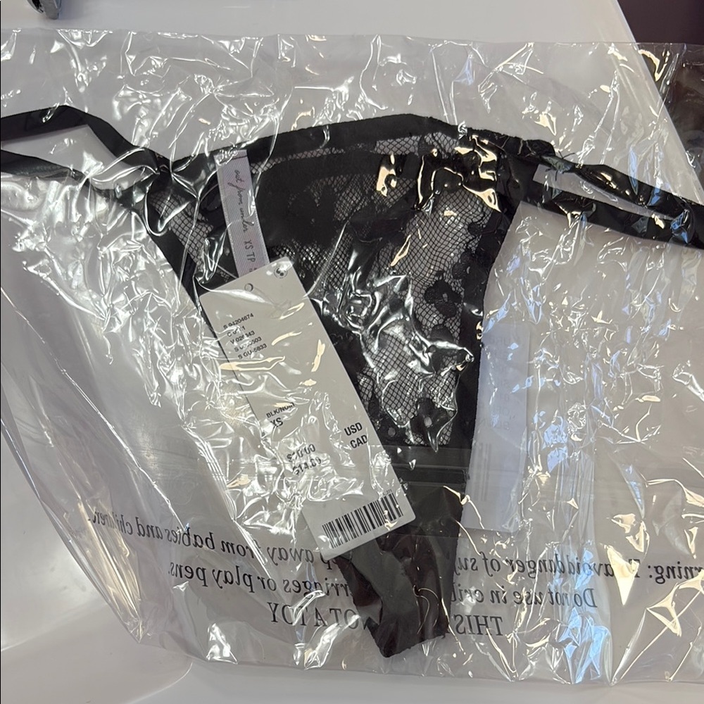 Out From Under Primrose Lace Thong XS (still in package)